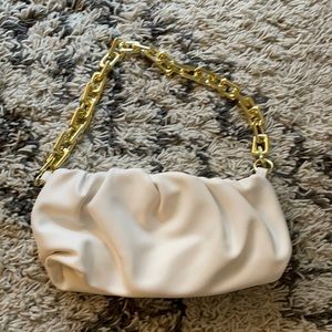 White dumpling bag with gold chain